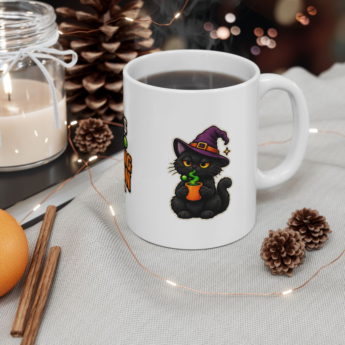 Black cat wearing a purple witch hat on white Halloween coffee mug