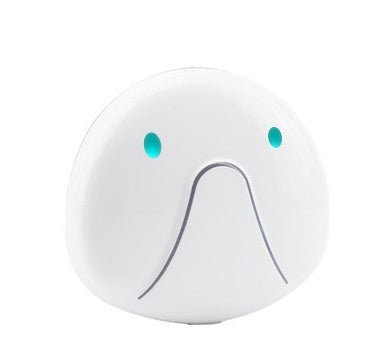 Round white device with blue lights and a black line on a white background