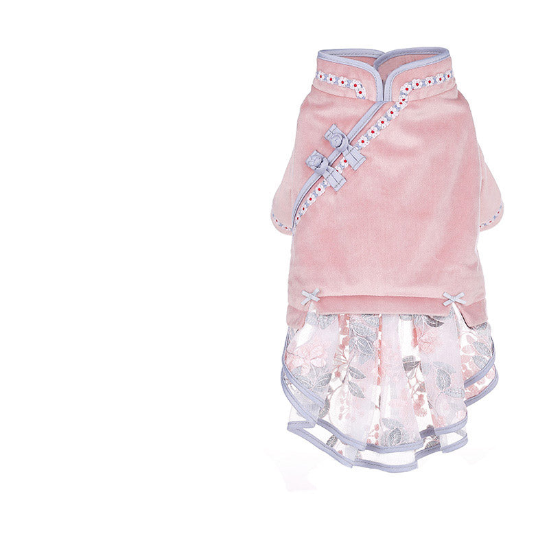 Pink pet dress with floral design on a white background