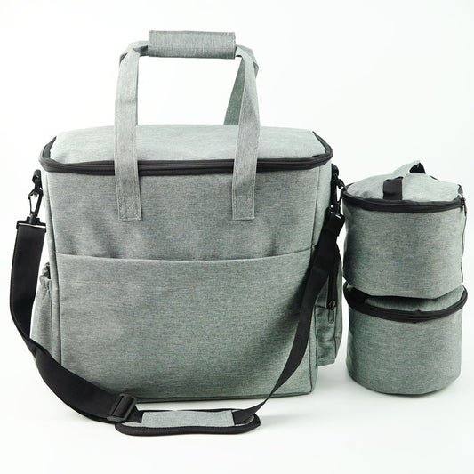 Gray cooler bag with detachable containers on a white background