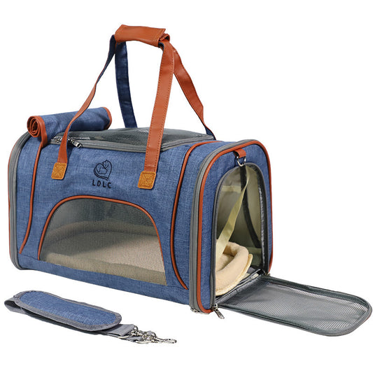 Blue pet carrier with brown accents on a white background