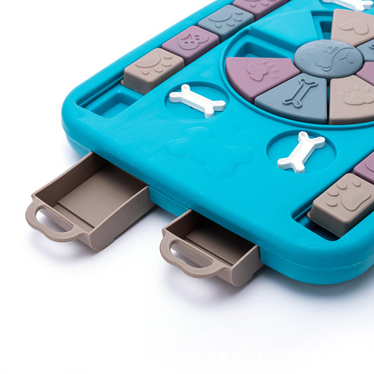 Blue toy with multiple compartments and animal-shaped buttons on a white background