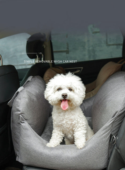 White dog sitting in a gray car seat with 'Simple Removable Wash Car Nest' text.