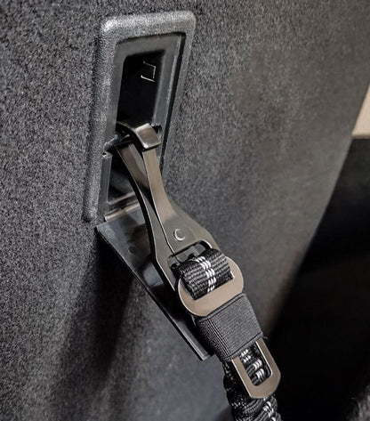 Car seat belt buckle and strap on a car interior