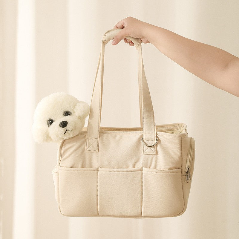 Beige tote bag with a white teddy bear peeking out on a beige background
