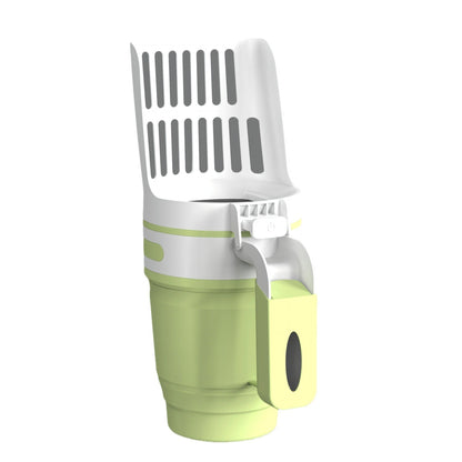 Green kitchen tool with a white spatula on a white background