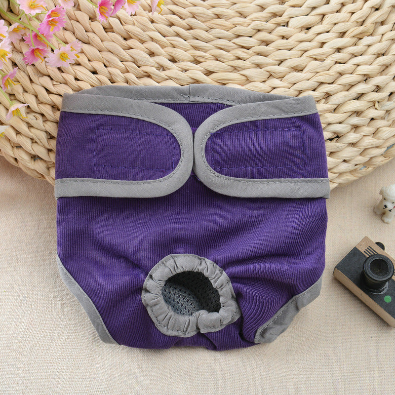 Purple pet diaper with gray accents on a woven surface