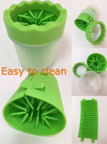 Green silicone kitchen tool with multiple components on a white background