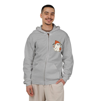 Black unisex Halloween zip-up hoodie with a trick-or-treat ghost design on the left chest
