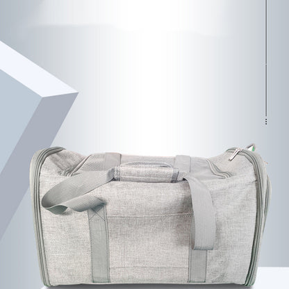 Gray duffel bag on a light gray background