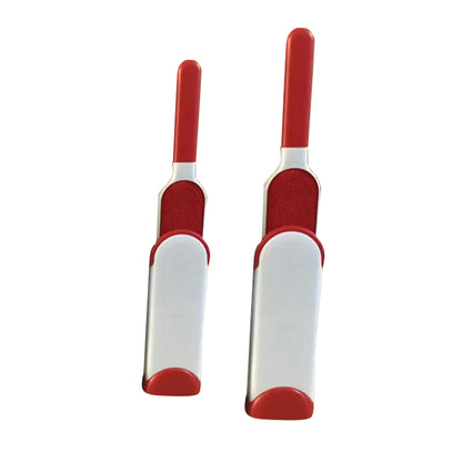 Two red and white pet grooming tools on a white background