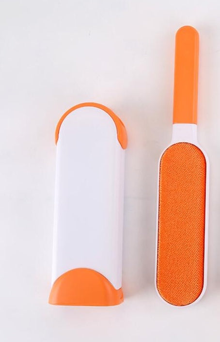 Two orange and white cleaning tools on a light gray background