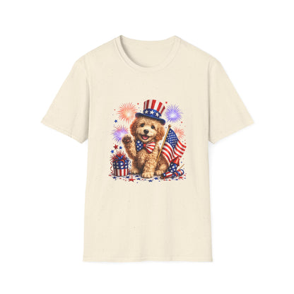 Beige t-shirt with a bear holding an American flag and fireworks design on a white background