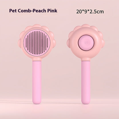 Pink pet comb on a light pink background with text indicating size.