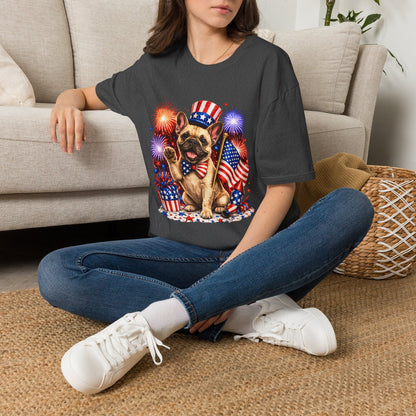 Person wearing a t-shirt with a dog graphic and American flag design, sitting on a carpeted floor.