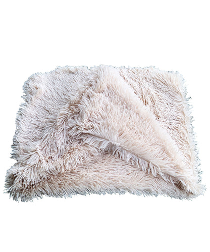 Beige fluffy blanket on a white background