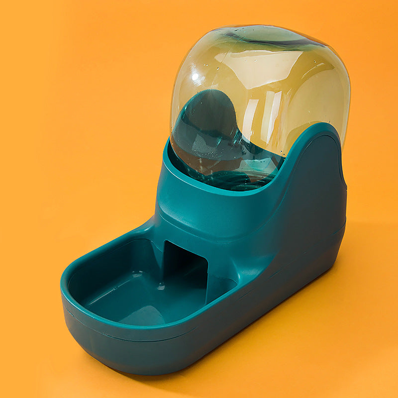 Teal pet water bottle with transparent top on an orange background