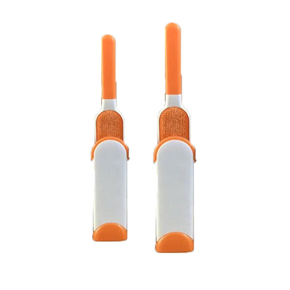 Two orange and white tools on a white background