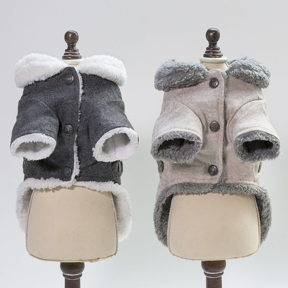 Two dog coats on mannequins against a white background