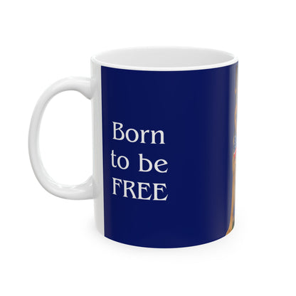 Navy blue mug with 'Born to be FREE' text on a white background