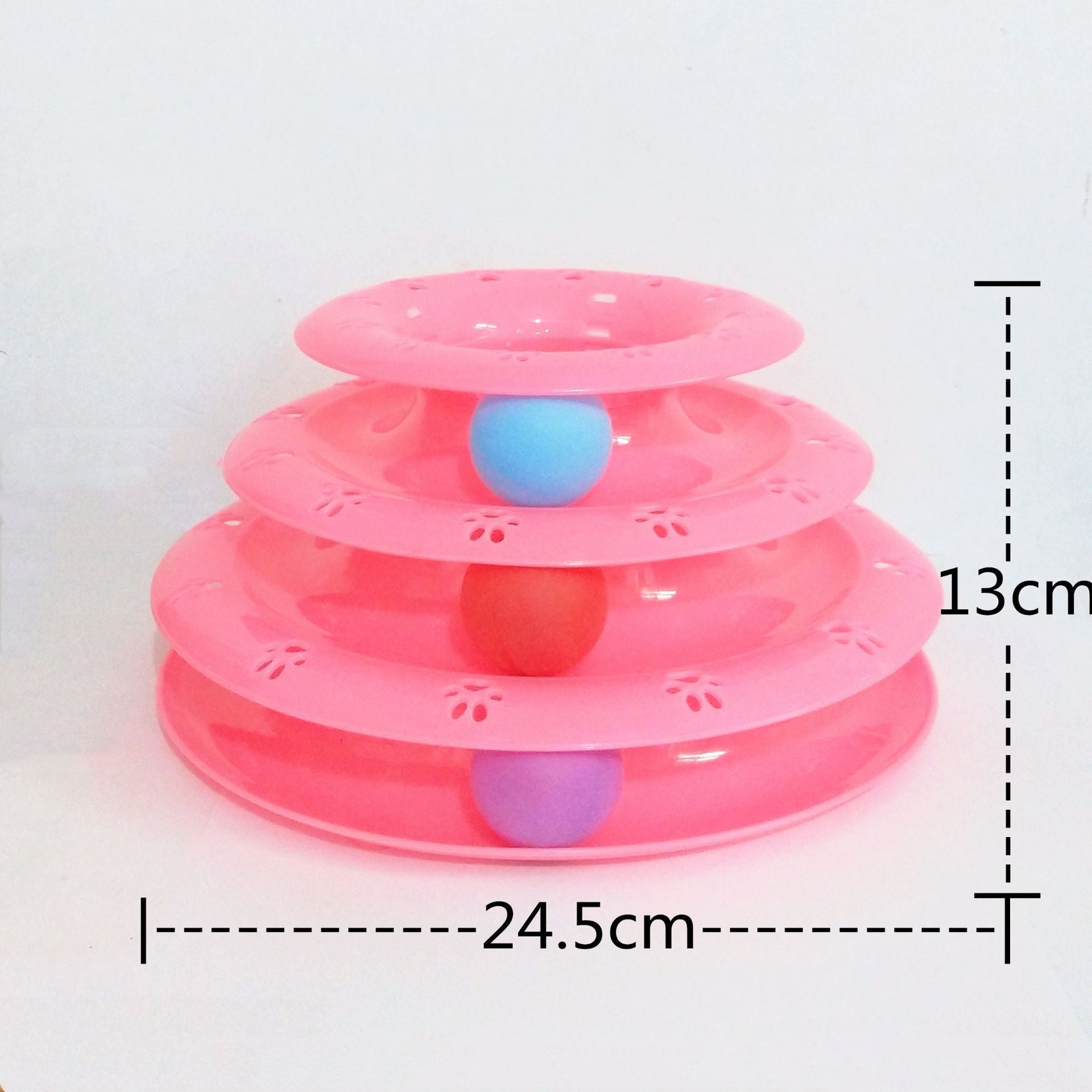 Pink three-tiered pet toy with colorful balls on a white background