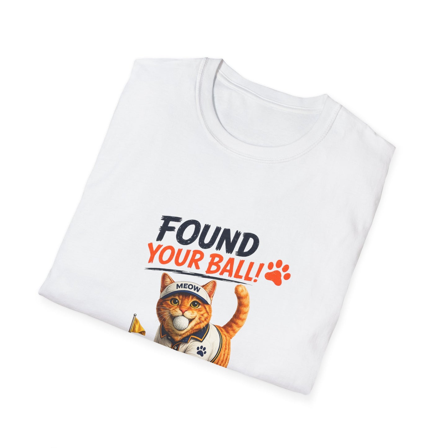 A folded white crewneck t-shirt with a graphic print of an orange tabby cat wearing a baseball cap and the text 'FOUND YOUR BALL!' in black and orange lettering, on a plain white background.