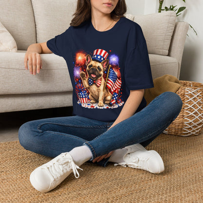 Person wearing a navy blue t-shirt with a dog graphic and American flag design, sitting on a carpeted floor.