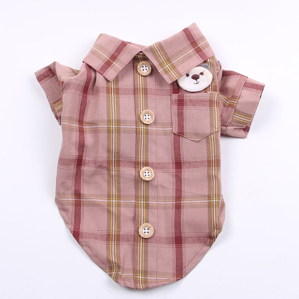 Plaid dog shirt with buttons and a bear tag on a white background