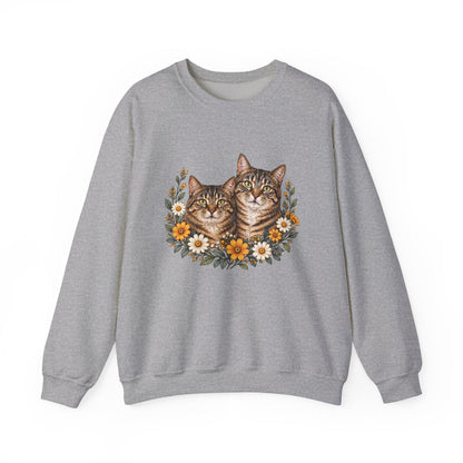 Grey crewneck sweatshirt featuring two tabby cats surrounded by orange and white wildflowers