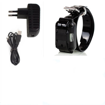 Black electronic dog collar with charger and cable on a white background