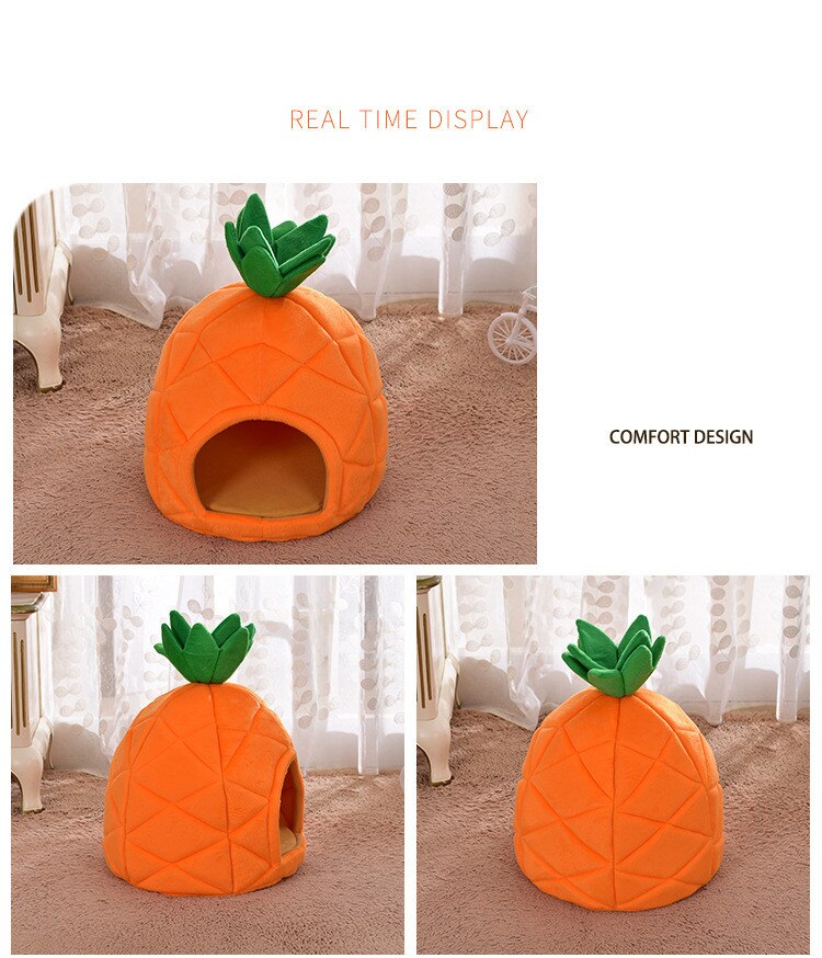 Pineapple-shaped pet bed with green leaves on a carpeted floor.