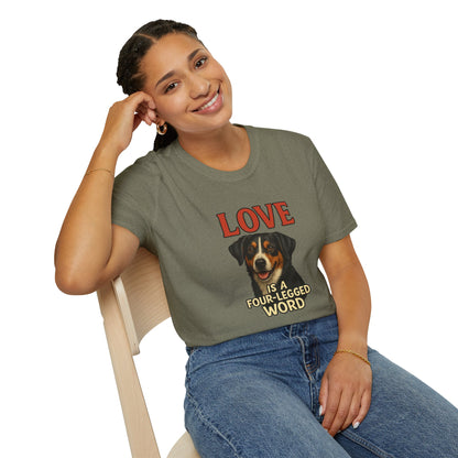 Person wearing a t-shirt with a dog graphic and text, sitting on a chair.