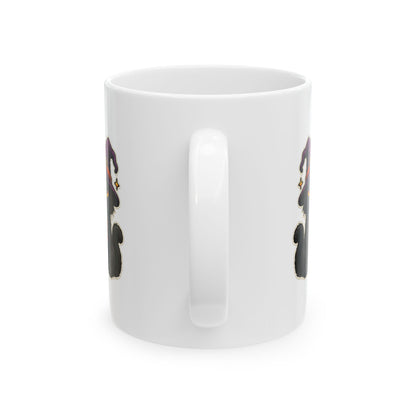 Black cat wearing a purple witch hat on white Halloween coffee mug  view from handleof cup
