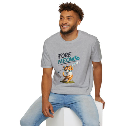 A man wearing a heather gray t-shirt with a cartoon graphic of a cat playing golf and the text 'FORE MEOW!'. He is sitting on a white block against a plain white background.