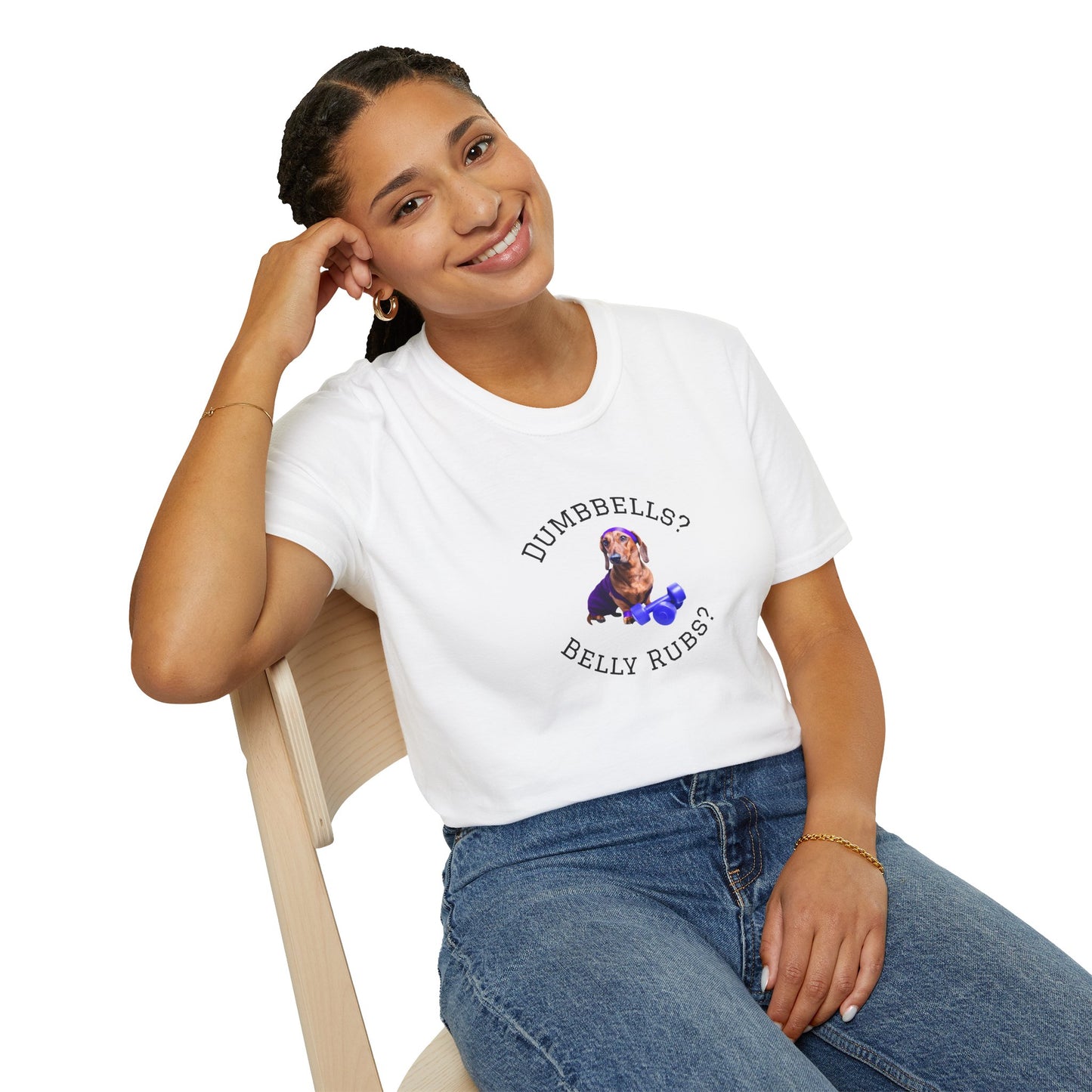 Person wearing a white t-shirt with a graphic and text, sitting on a chair against a white background