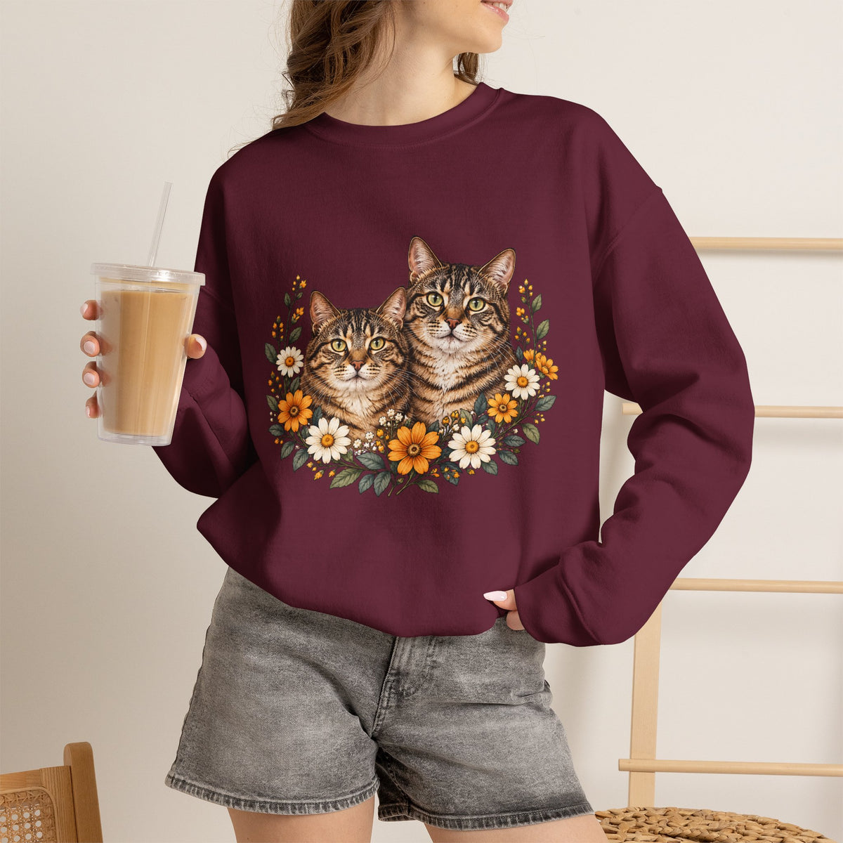 Maroon cat lover sweatshirt with two tabby cats and orange and white flowers