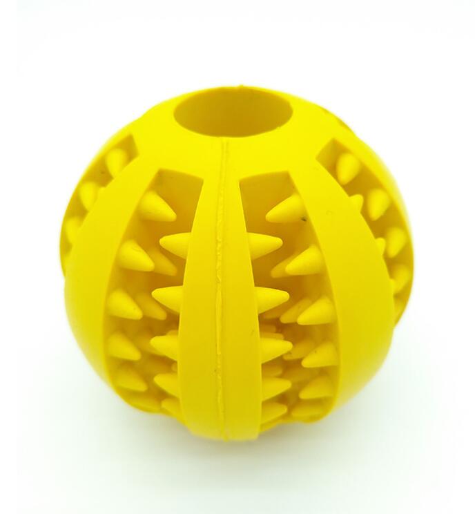 Yellow textured ball on a white background
