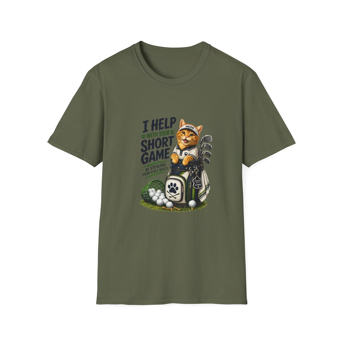 A military green graphic T-shirt is displayed in a styled flat lay on a light beige surface. The shirt features a cartoon cat wearing a baseball cap and holding golf clubs, with the text 'I HELP WITH YOUR SHORT GAME BY STEALING GOLF BALLS.