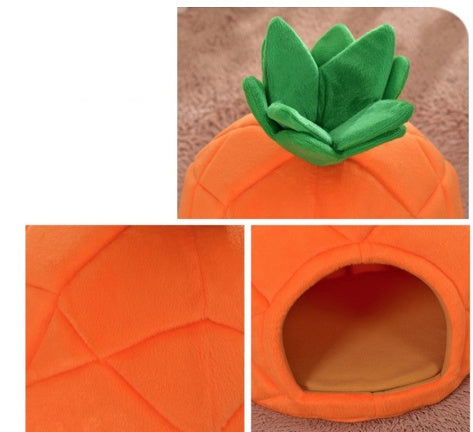 Pineapple-shaped pet bed with green roof on a brown surface