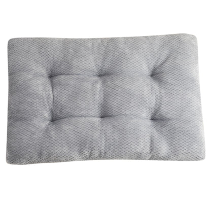 Gray textured cushion on a white background