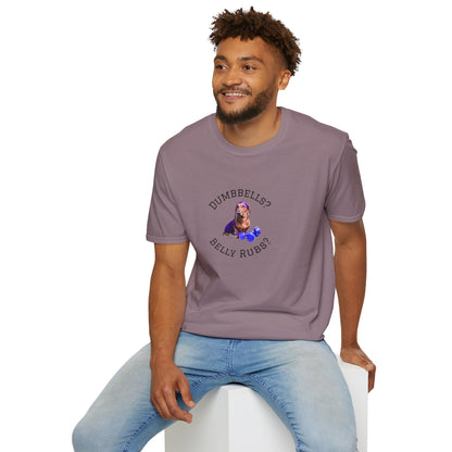 Man wearing a purple t-shirt with text and graphics, sitting on a white stool against a white background.