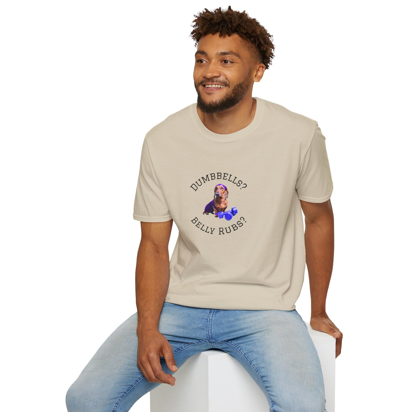 Man wearing a beige t-shirt with a dog graphic and text on a white background