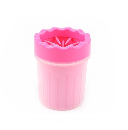 Pink plastic container with a lid on a white background