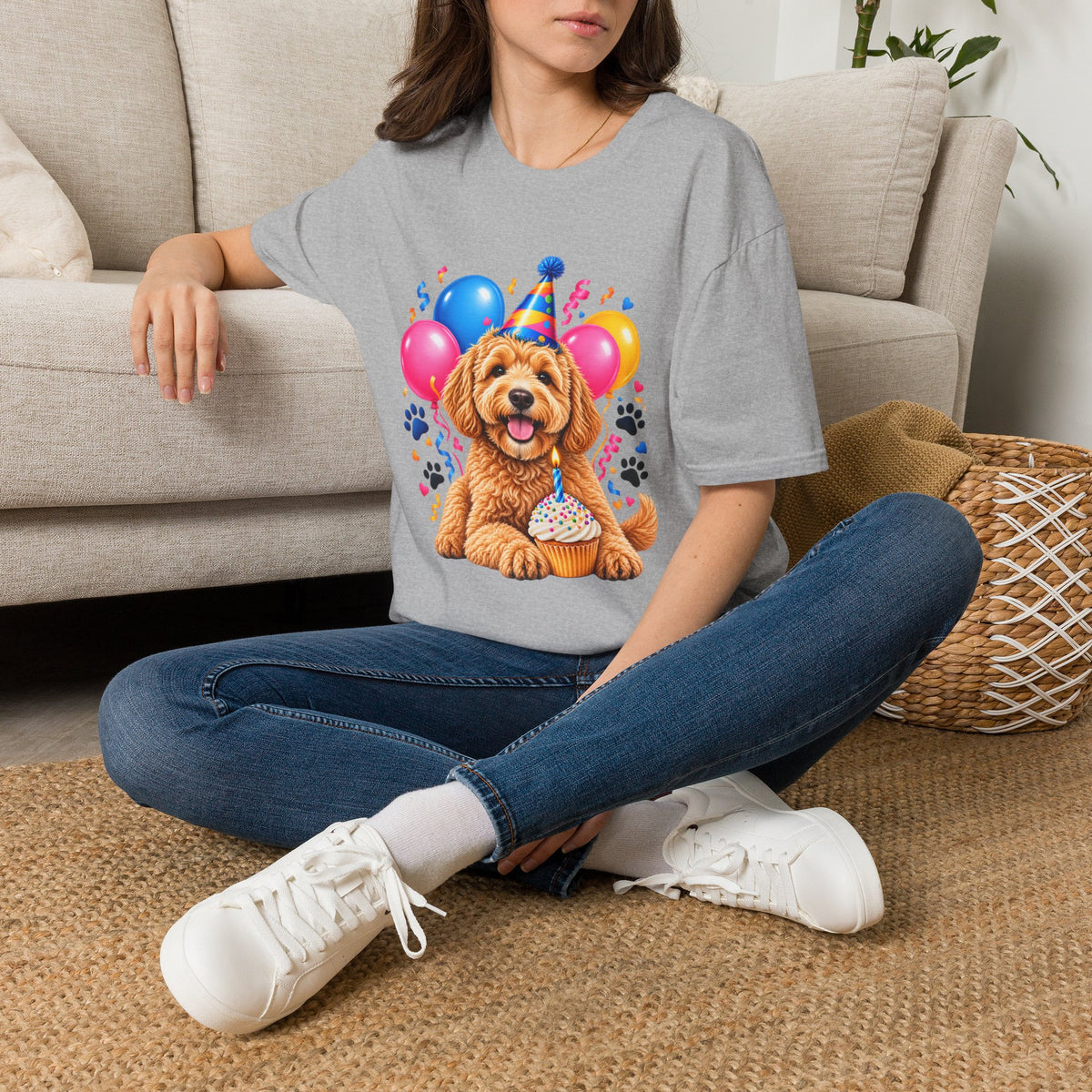 Woman sitting on floor wearing a Sport Grey Birthday Dog T-Shirt with cute puppy birthday design