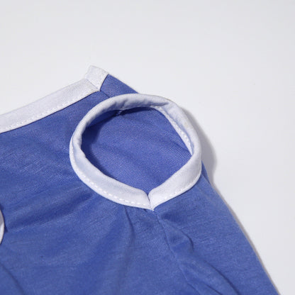 Blue garment with white trim on a light gray background
