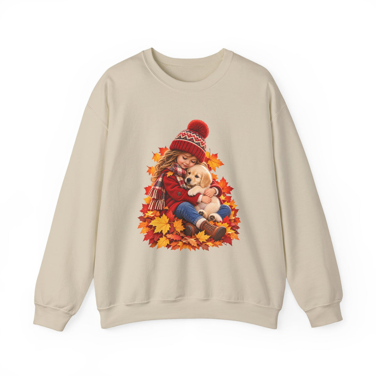Sand crewneck sweatshirt featuring a little girl cuddling a golden retriever puppy among autumn leaves
