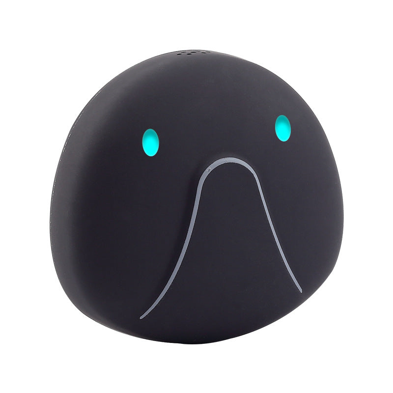 Black elephant-shaped object with glowing eyes on a white background