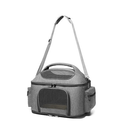 Gray pet carrier with a handle on a white background