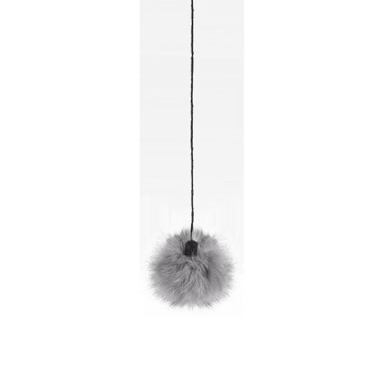 Gray fur pom-pom hanging from a black string on a white background