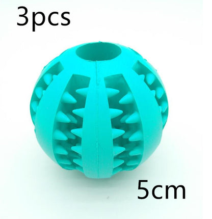 Turquoise rubber ball with textured surface on a white background